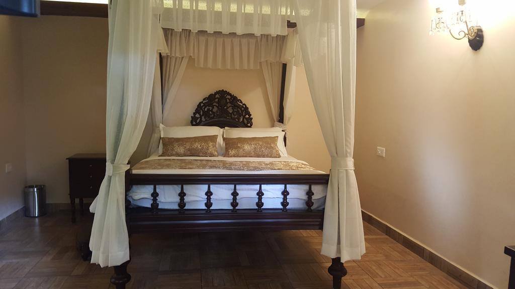 Casa Menezes - A Heritage Goan Homestay Bambolim Værelse billede