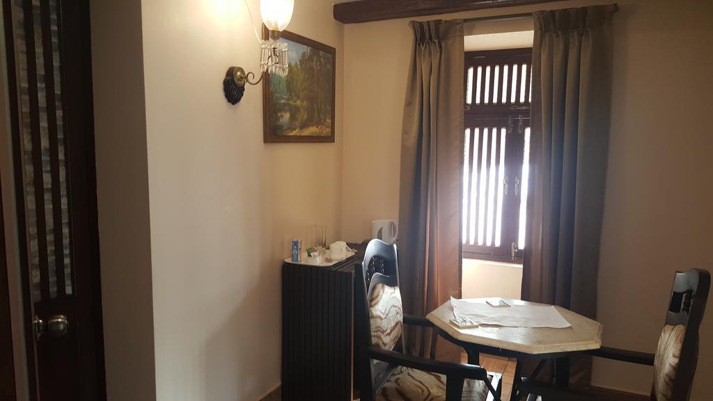 Casa Menezes - A Heritage Goan Homestay Bambolim Værelse billede
