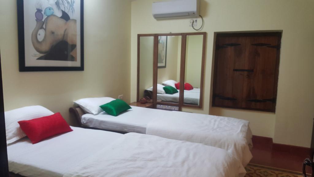Casa Menezes - A Heritage Goan Homestay Bambolim Værelse billede